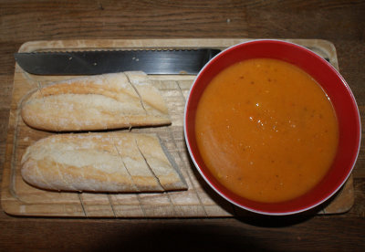 Spiced sweet potato and squash soup in bowl